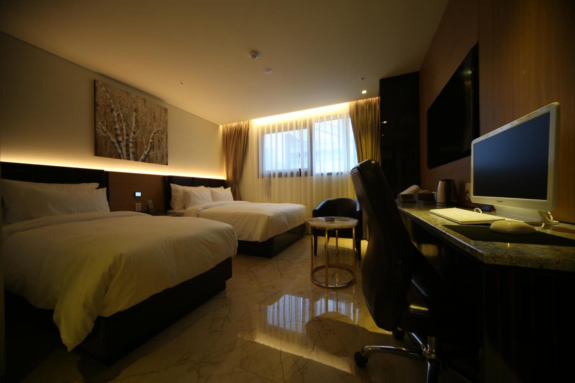 First Hotel Guri Phòng bức ảnh